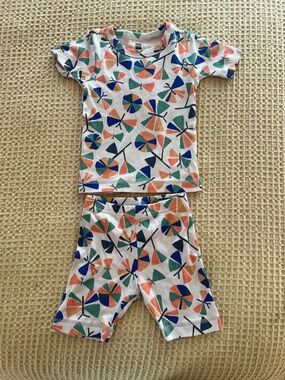 Tea Collection Kids Pajama Set with Coral, Blue & Green Pinwheel Print